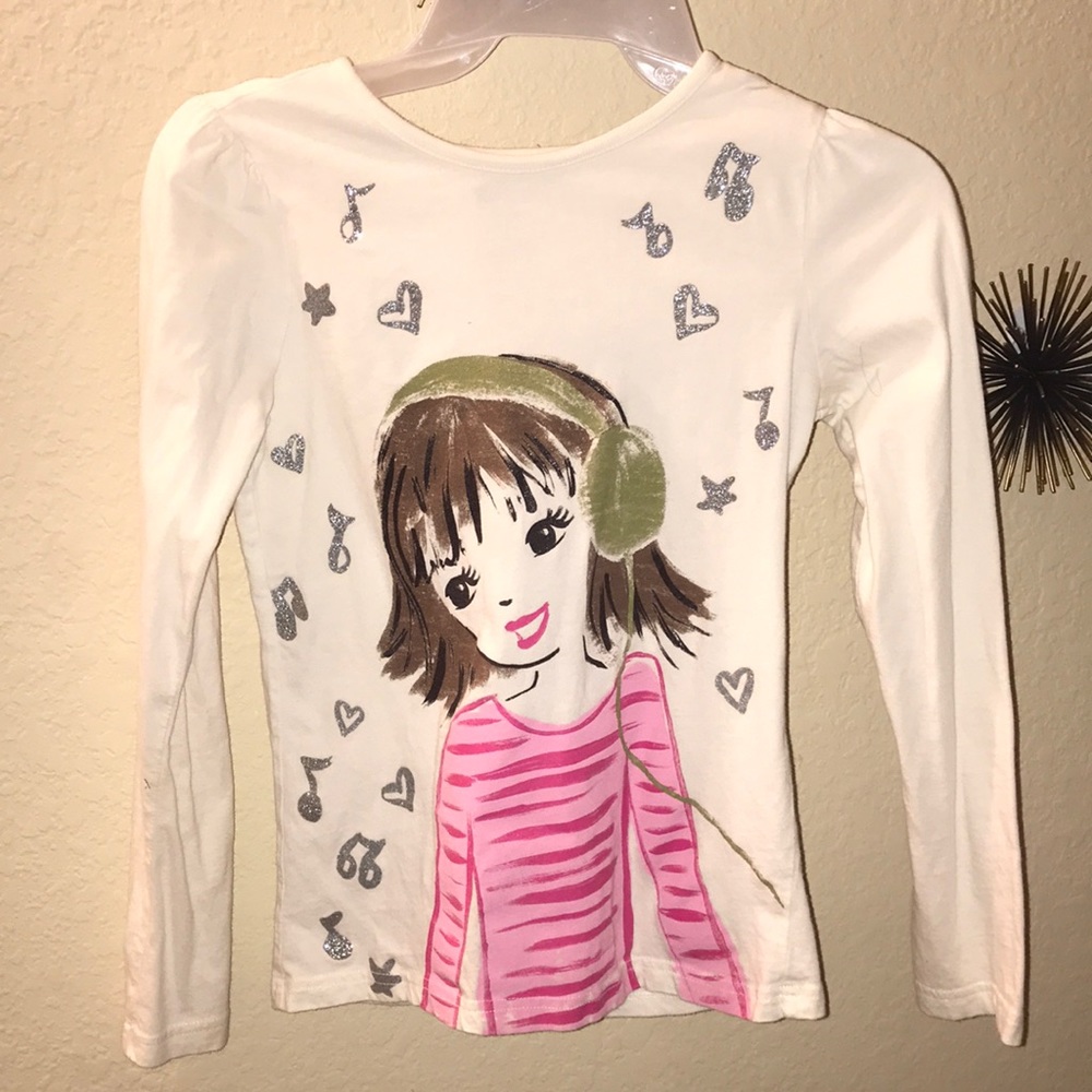 A girls long sleeve tee shirt.